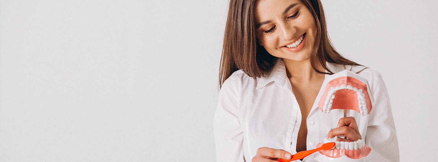 Woman with teeth and toothbrush